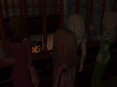 The four girls had crept as far as the gallery above the the King's hall.